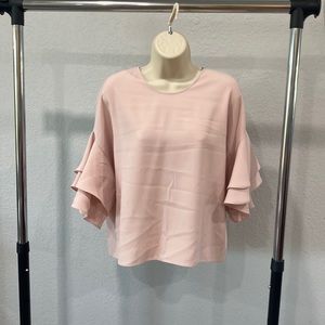 Blush colored blouse